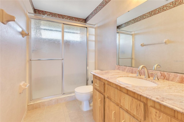 728 Waterbridge Dr, Winter Haven, FL 33880 - bathroom featuring a shower stall, tile patterned floors, toilet, and vanity