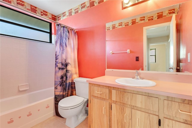 728 Waterbridge Dr, Winter Haven, FL 33880 - bathroom featuring toilet, tile patterned floors, vanity, and shower / bath combo