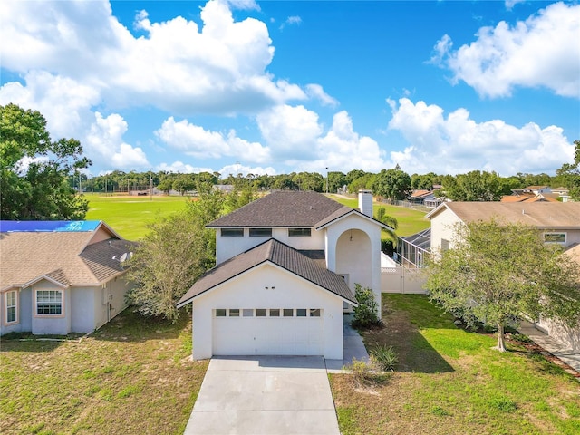 728 Waterbridge Dr, Winter Haven, FL 33880 - view of front of house featuring concrete driveway, a garage, a chimney, and stucco siding