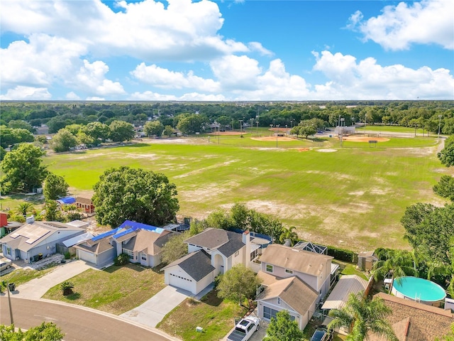 728 Waterbridge Dr, Winter Haven, FL 33880 - aerial perspective of suburban area with a tree filled landscape