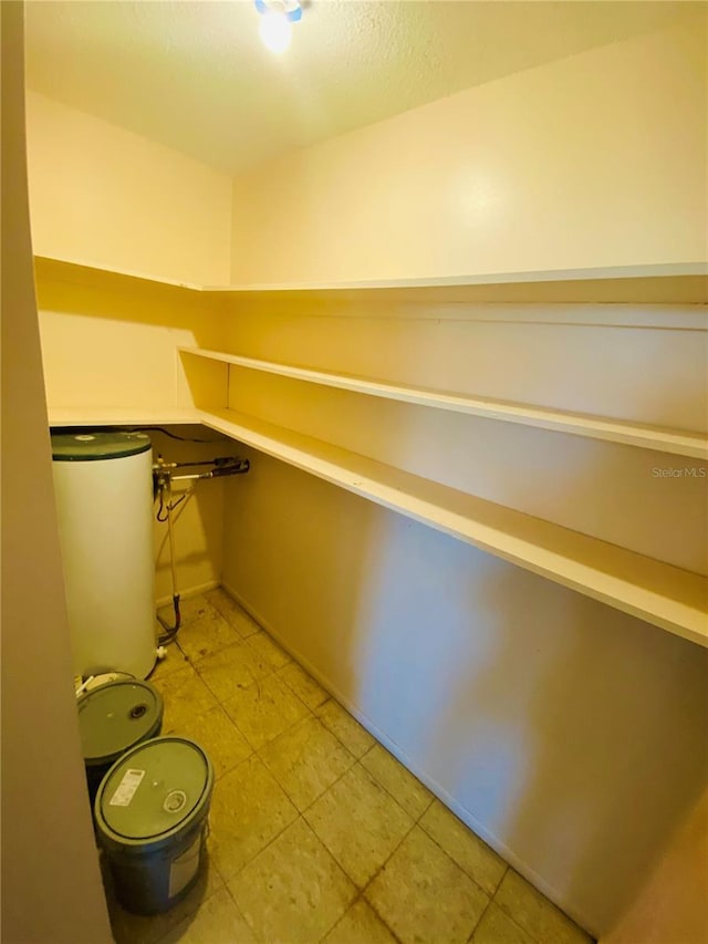 4351 Tahitian Gardens Cir Unit H, Holiday, FL 34691 - storage area with gas water heater