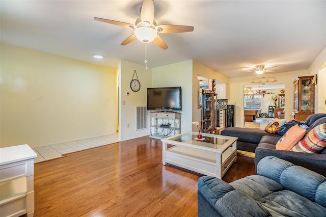 2308 Rio Cir, Spring Hill, FL 34608 - living area with ceiling fan and wood finished floors