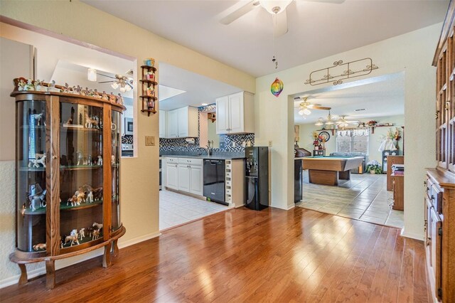 2308 Rio Cir, Spring Hill, FL 34608 - bar area featuring ceiling fan, dishwasher, pool table, and light wood-type flooring