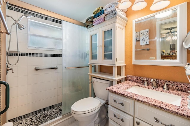 2308 Rio Cir, Spring Hill, FL 34608 - bathroom with a stall shower, toilet, and vanity