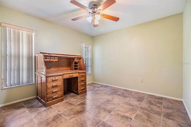 2308 Rio Cir, Spring Hill, FL 34608 - office area featuring ceiling fan and baseboards