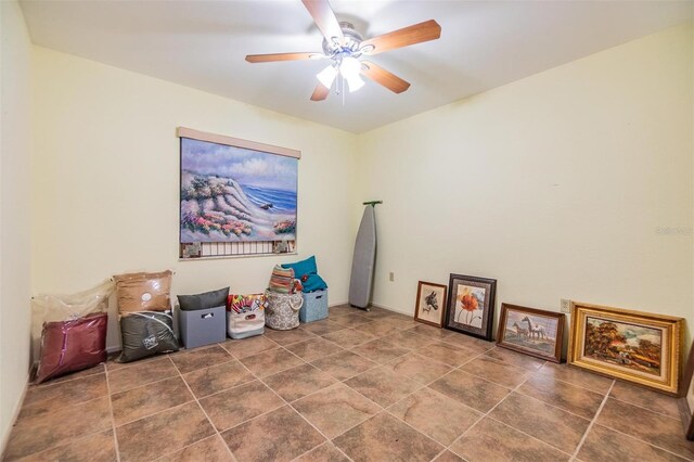 2308 Rio Cir, Spring Hill, FL 34608 - spare room featuring a ceiling fan and tile patterned flooring