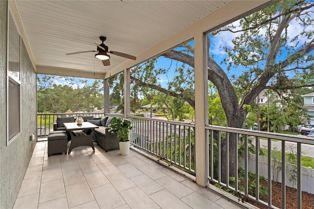 view of patio with a ceiling fan and outdoor lounge area