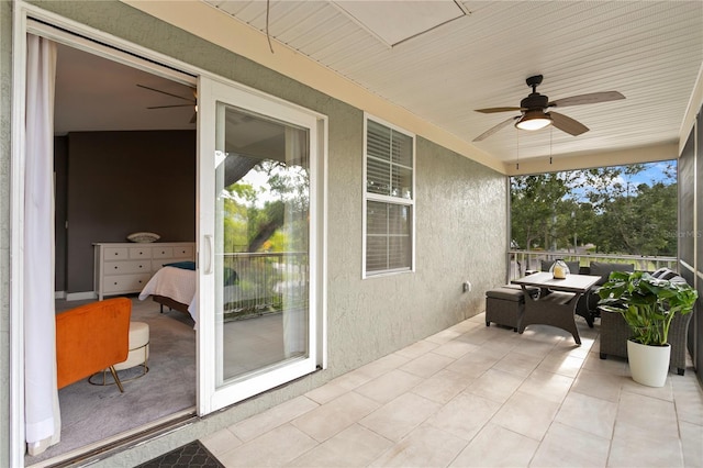 view of patio / terrace featuring ceiling fan