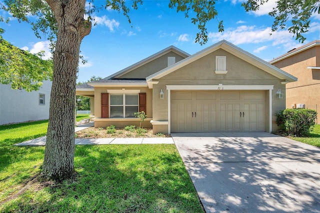 7103 Bridgeview Dr, Wesley Chapel, FL 33545 - view of front facade with stucco siding, an attached garage, driveway, and a front yard