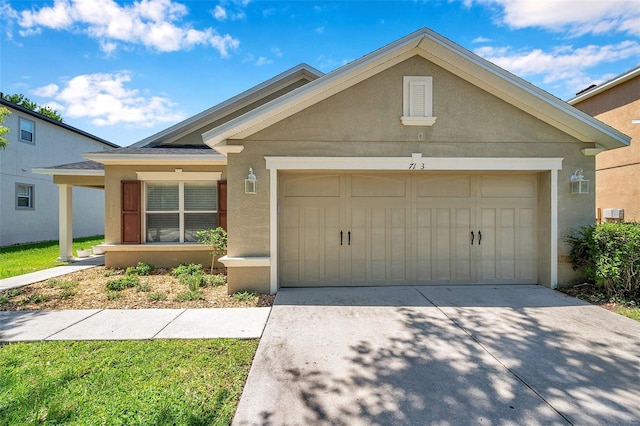 7103 Bridgeview Dr, Wesley Chapel, FL 33545 - view of front of house featuring stucco siding, a garage, and concrete driveway