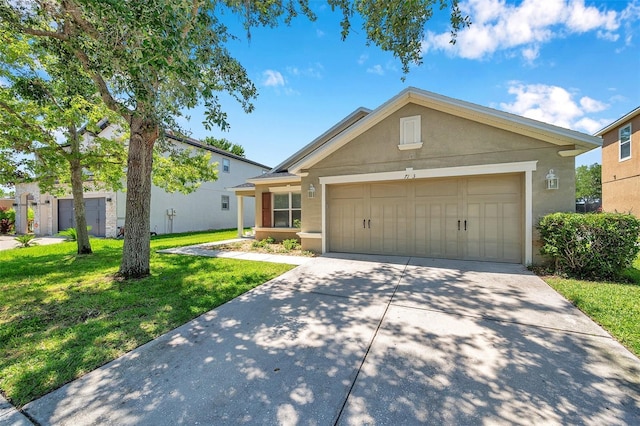 7103 Bridgeview Dr, Wesley Chapel, FL 33545 - view of front of home with a front lawn, driveway, a garage, and stucco siding