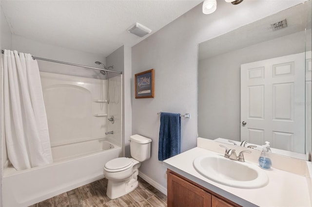 7103 Bridgeview Dr, Wesley Chapel, FL 33545 - full bath featuring shower / bathtub combination with curtain, vanity, toilet, wood finished floors, and baseboards