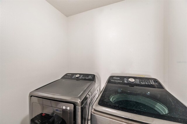 7103 Bridgeview Dr, Wesley Chapel, FL 33545 - washroom with independent washer and dryer