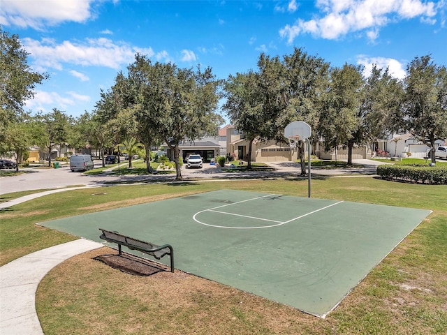 7103 Bridgeview Dr, Wesley Chapel, FL 33545 - view of basketball court with community basketball court, a yard, and a residential view