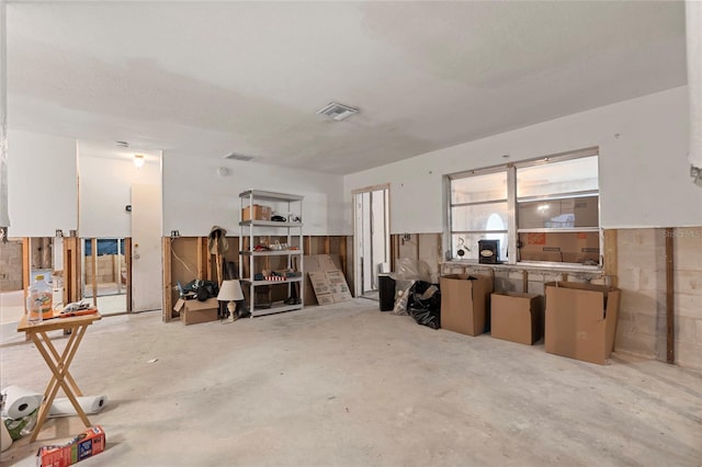 701 59th Ave NE, Saint Petersburg, FL 33703 - misc room with unfinished concrete floors