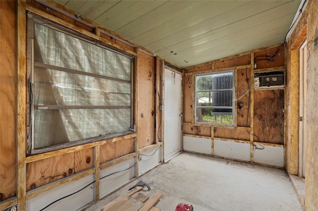 701 59th Ave NE, Saint Petersburg, FL 33703 - unfurnished sunroom featuring an AC wall unit