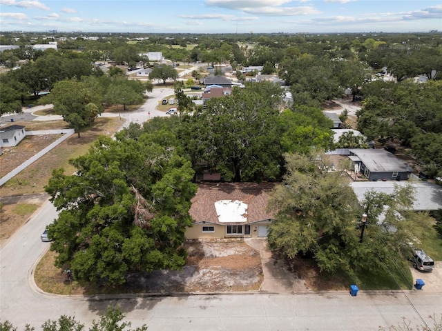 701 59th Ave NE, Saint Petersburg, FL 33703 - aerial perspective of suburban area with a tree filled landscape