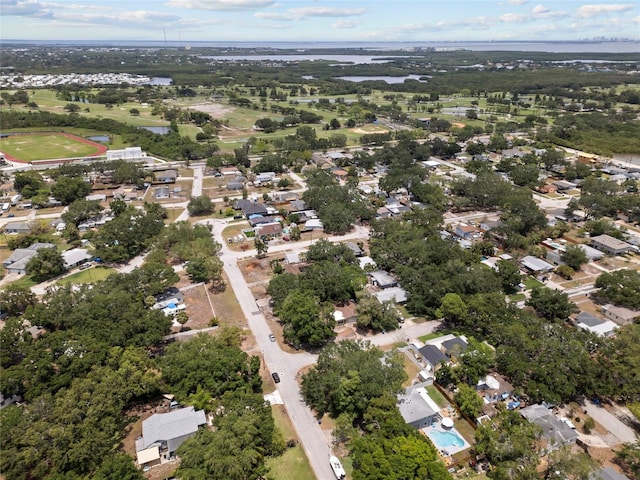 701 59th Ave NE, Saint Petersburg, FL 33703 - aerial view of property and surrounding area with a large body of water and nearby suburban area