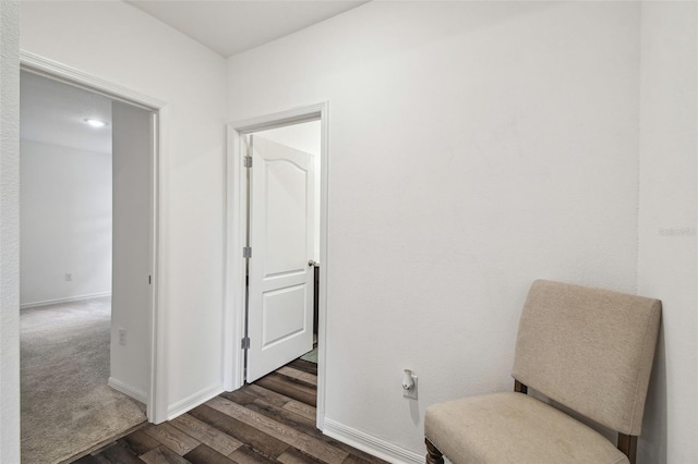 14282 Coronado Dr, Spring Hill, FL 34609 - sitting room with dark wood finished floors and baseboards