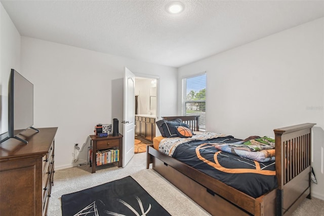 14282 Coronado Dr, Spring Hill, FL 34609 - bedroom with light carpet, a textured ceiling, baseboards, and connected bathroom