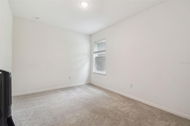 14282 Coronado Dr, Spring Hill, FL 34609 - carpeted spare room with baseboards