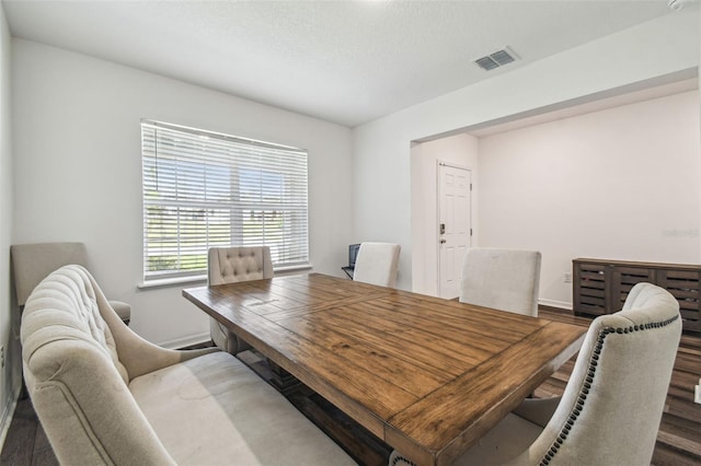 14282 Coronado Dr, Spring Hill, FL 34609 - dining room featuring wood finished floors and baseboards