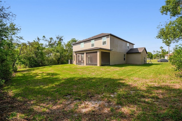 14282 Coronado Dr, Spring Hill, FL 34609 - view of grassy yard featuring a sunroom and central air condition unit