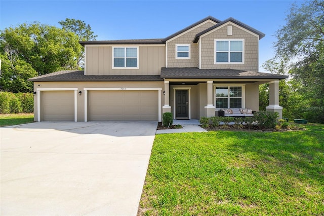 14282 Coronado Dr, Spring Hill, FL 34609 - view of front of home featuring covered porch, concrete driveway, a front yard, a shingled roof, and a garage