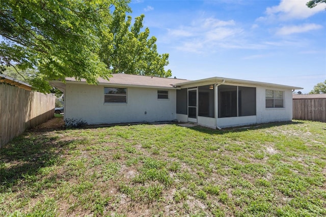 7215 San Moritz Dr, Port Richey, FL 34668 - rear view of property with a sunroom and stucco siding