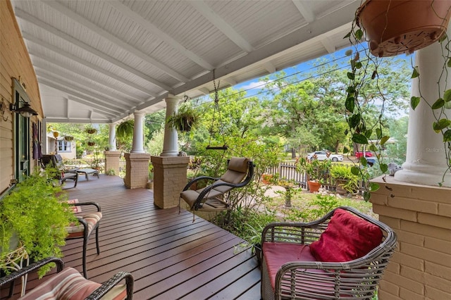 1001 E Crawford St, Tampa, FL 33604 - wooden deck featuring a porch and fence