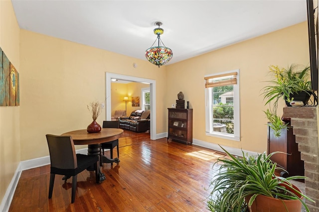 1001 E Crawford St, Tampa, FL 33604 - dining room featuring wood-type flooring and baseboards