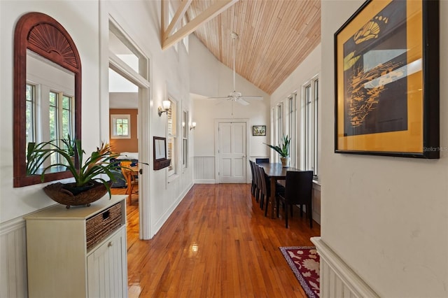 1001 E Crawford St, Tampa, FL 33604 - foyer entrance with light wood-style floors, a wainscoted wall, ceiling fan, wood ceiling, and a decorative wall