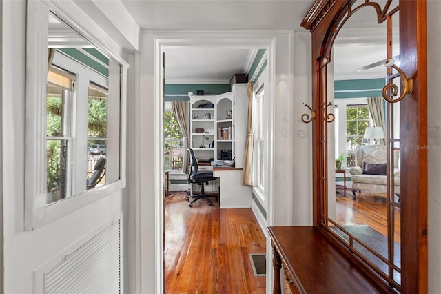 1001 E Crawford St, Tampa, FL 33604 - hallway featuring an office area, wood-type flooring, and crown molding