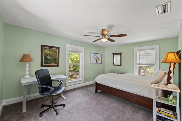 1001 E Crawford St, Tampa, FL 33604 - carpeted bedroom featuring baseboards and a ceiling fan