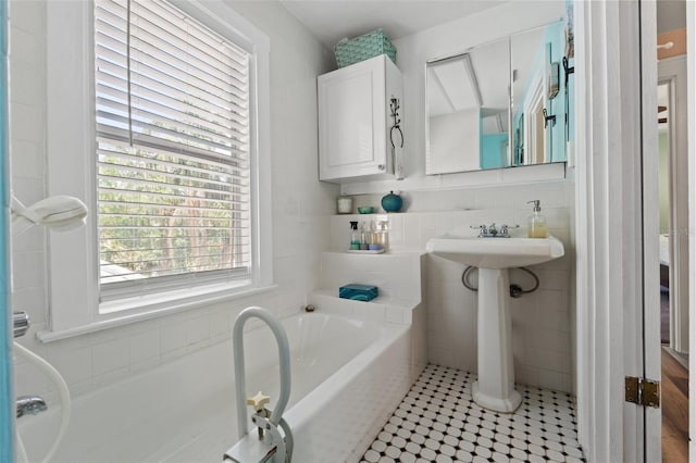 1001 E Crawford St, Tampa, FL 33604 - full bath with a garden tub and tile patterned flooring