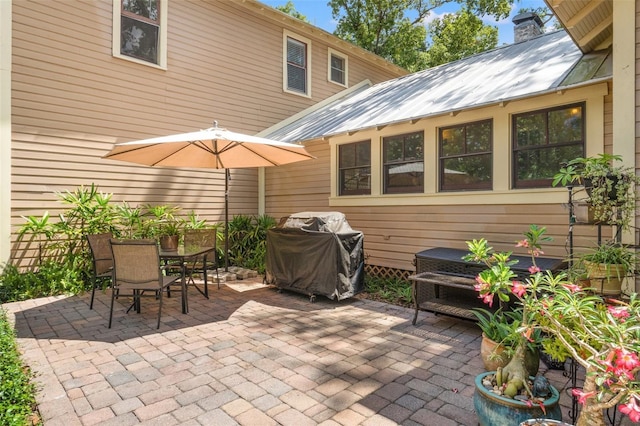 1001 E Crawford St, Tampa, FL 33604 - view of patio / terrace featuring area for grilling and outdoor dining area