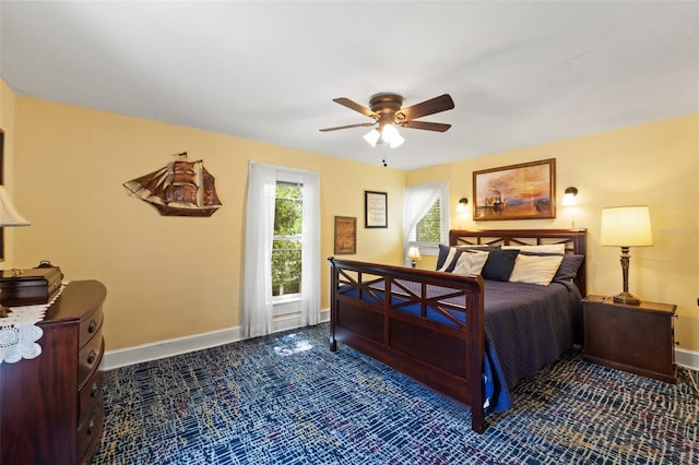 1001 E Crawford St, Tampa, FL 33604 - carpeted bedroom with baseboards and a ceiling fan