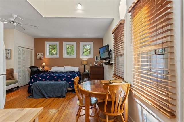 1001 E Crawford St, Tampa, FL 33604 - bedroom featuring light wood-type flooring, a closet, and a ceiling fan