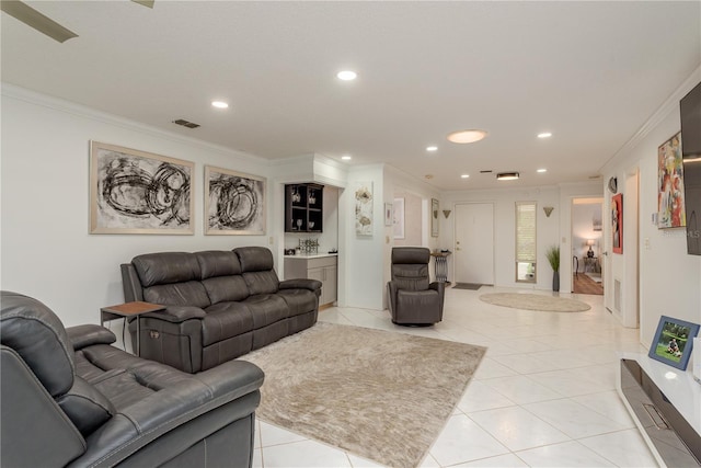 3071 Bolt Dr, Palm Harbor, FL 34685 - living room with ornamental molding, recessed lighting, and light tile patterned floors