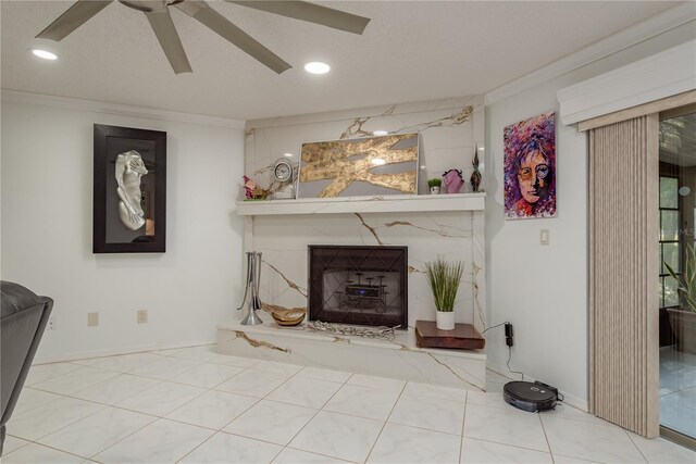 3071 Bolt Dr, Palm Harbor, FL 34685 - living area with crown molding, a high end fireplace, a ceiling fan, and recessed lighting