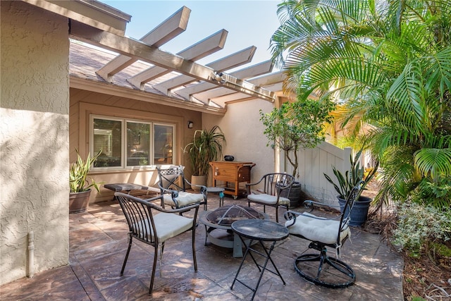 3071 Bolt Dr, Palm Harbor, FL 34685 - view of patio with an outdoor fire pit and a pergola