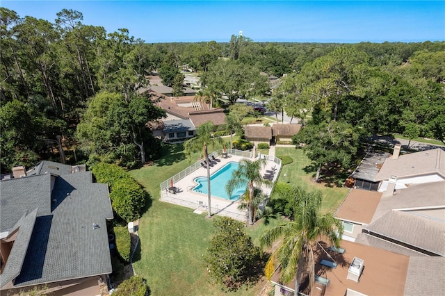 3071 Bolt Dr, Palm Harbor, FL 34685 - drone / aerial view of a pool area and a heavily wooded area