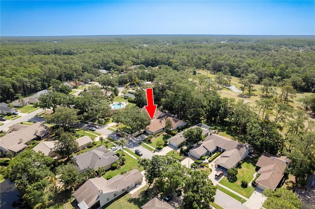 3071 Bolt Dr, Palm Harbor, FL 34685 - aerial view of property's location with a forest and nearby suburban area