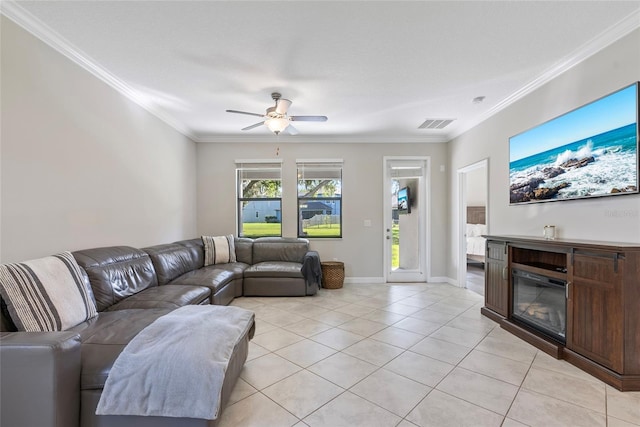 4690 Coachford Dr, Wesley Chapel, FL 33543 - living room with a ceiling fan, light tile patterned floors, ornamental molding, and baseboards