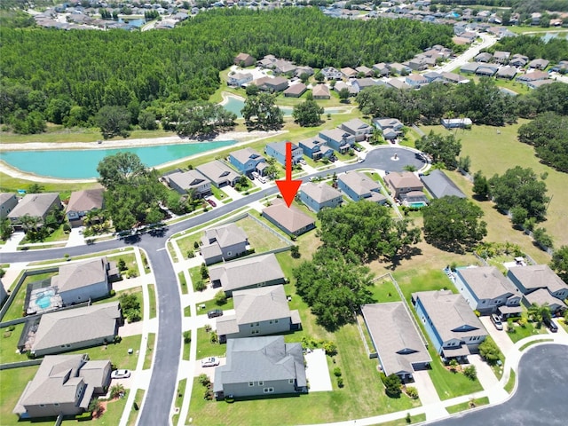 4690 Coachford Dr, Wesley Chapel, FL 33543 - aerial view of property and surrounding area featuring nearby suburban area and a pool