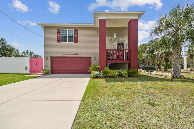 3227 Rose Arbor Dr, Hernando Beach, FL 34607 - view of front of house with a garage, driveway, and stucco siding