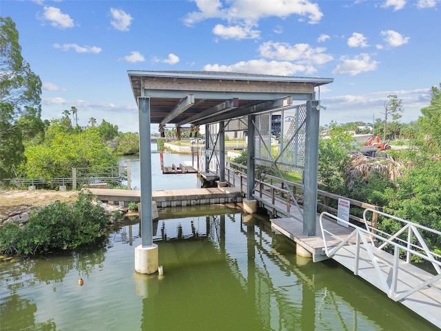 3227 Rose Arbor Dr, Hernando Beach, FL 34607 - dock area featuring a water view and boat lift