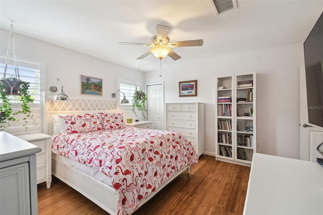 3227 Rose Arbor Dr, Hernando Beach, FL 34607 - bedroom with wood finished floors, a closet, and ceiling fan