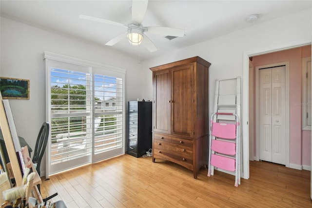3227 Rose Arbor Dr, Hernando Beach, FL 34607 - home office with light wood-type flooring and ceiling fan