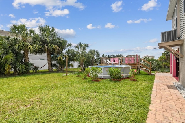 3227 Rose Arbor Dr, Hernando Beach, FL 34607 - view of yard with a deck with water view and stairs